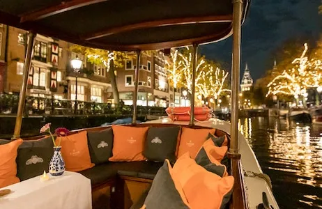 Amsterdam Ticket Amsterdã: cruzeiro noturno em barco aberto no canal da estação central
