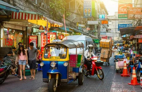 Cycle through the narrow alleys of Chinatown